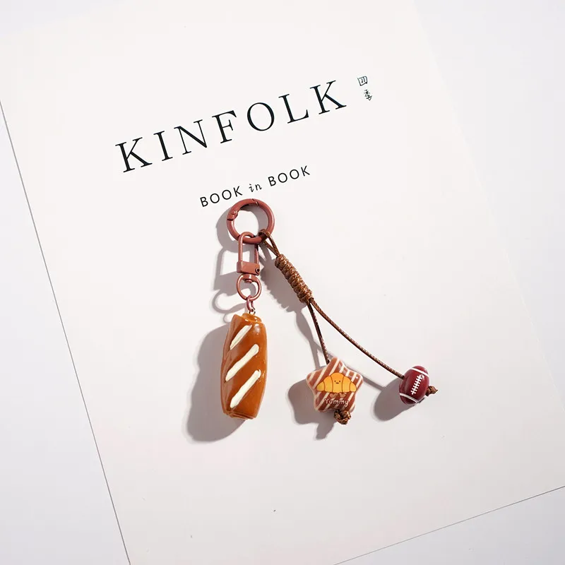 新しい可愛い漫画風アルカリ水パンキーホルダーペンダントバッグペンダント小さなギフト車学校バッグリトルレッドブック