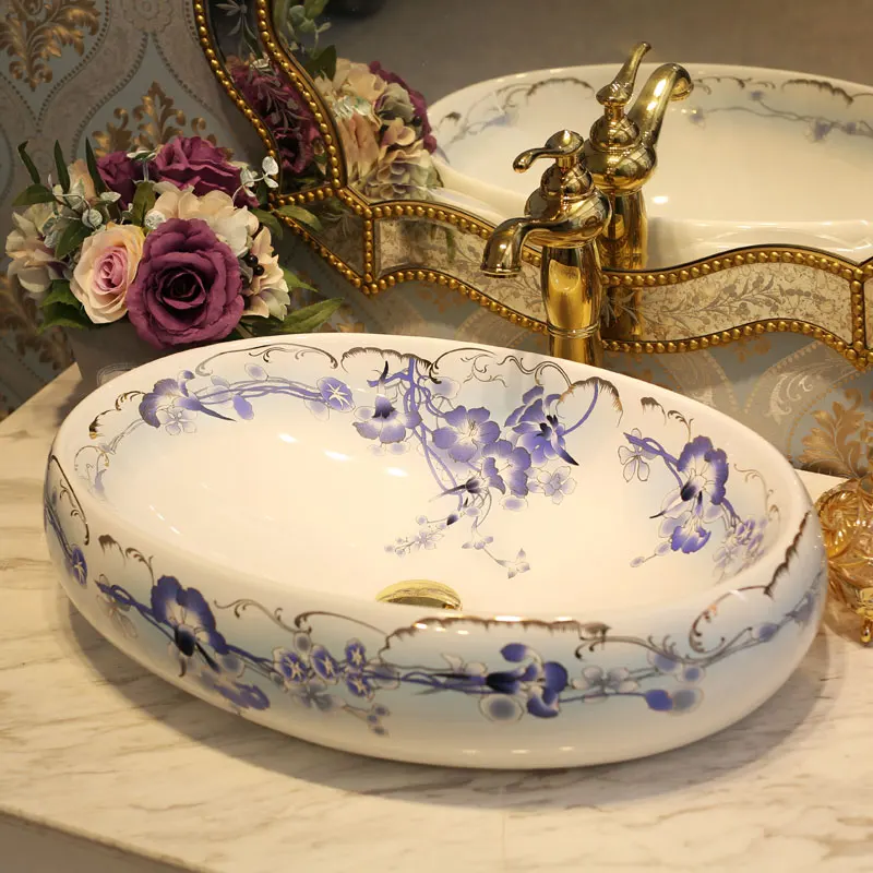 

Blue and white China Artistic Handmade Art wash basin Ceramic Counter Top Wash Basin Bathroom Sinks Oval shape hand washing sink