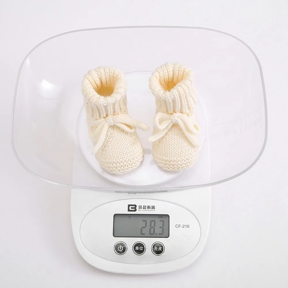 Nuevos zapatos bonitos para caminar con lazo, zapatos cómodos tejidos para niños pequeños, calcetines suaves y cálidos para gatear en el suelo para recién nacidos de 0 a 12 meses