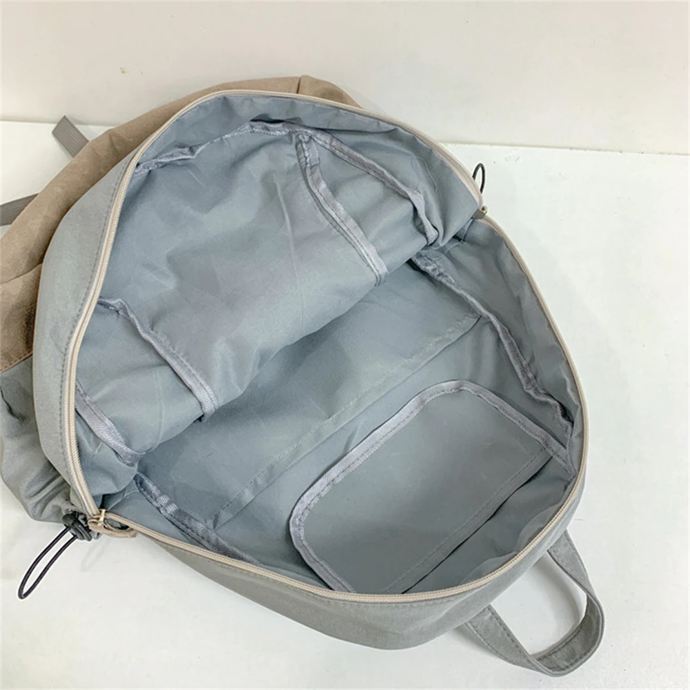 Bolso de mujer de Color sólido, mochila de nailon de alta calidad a la moda para mujer, nueva mochila para estudiantes de gran capacidad, Bolsos de viaje para mujer