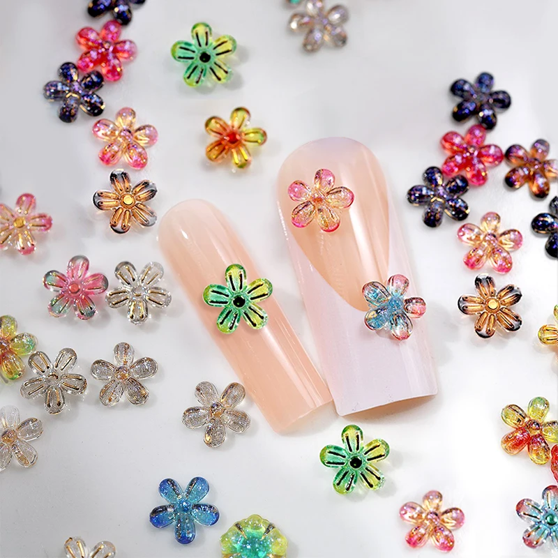 50 pz fiore colorato ciondoli per unghie fiore trasparente ghiaccio con Glitter oro fiocco Nail Art decorazione 3D accessori per Manicure fai da te