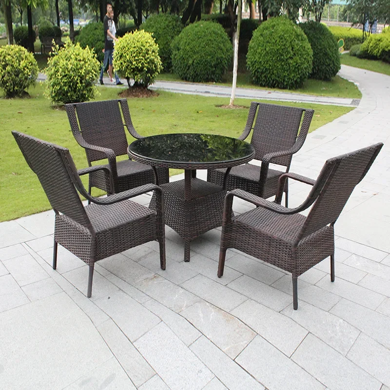 

Outdoor rattan chairs three five-piece balcony tables and chairs rattan courtyard bar catering