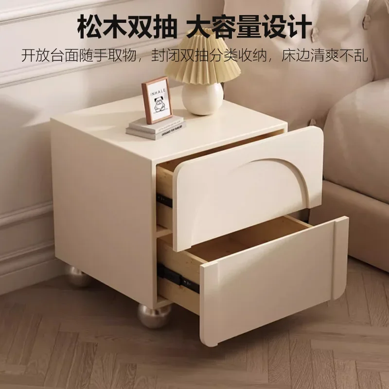 

Cream wind bedside table simple modern solid wood light luxury high sense Internet celebrity creative bedroom storage small beds