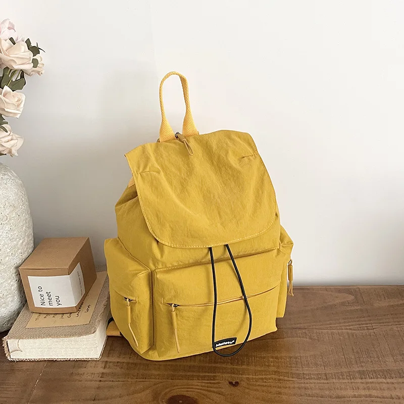 New female Korean version of literary and artistic student niche drawstring ultra-light dual-purpose travel small backpack