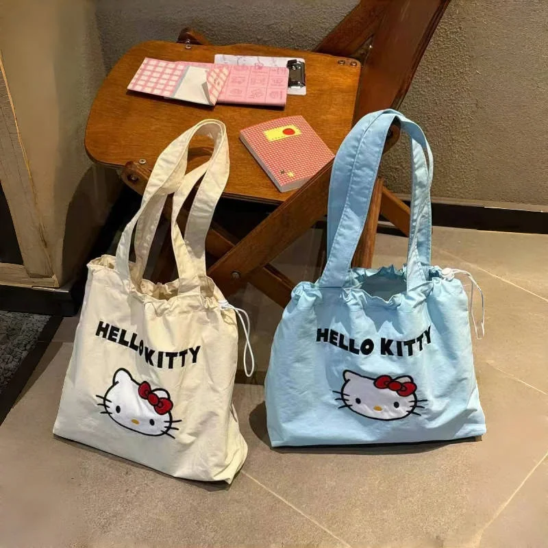 

Холщовая сумка Hello Kitty на шнурке, студенческая легкая универсальная сумка на плечо для поездок на работу, ниша, большая вместительная сумка-тоут высокого качества