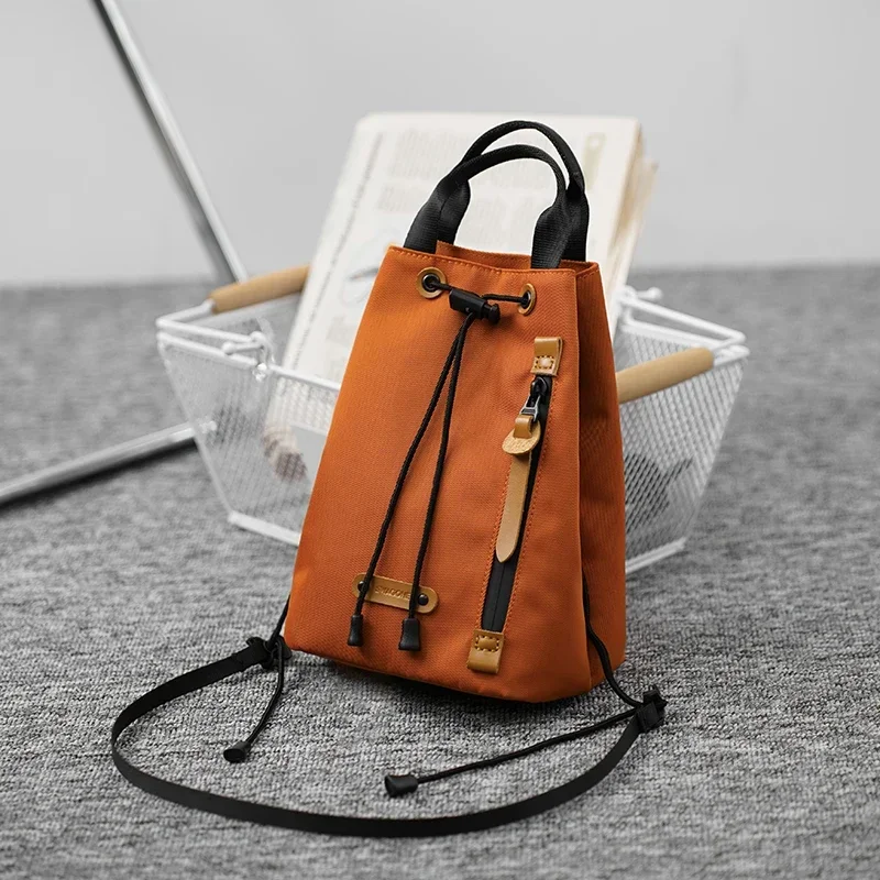 

Летняя новая текстура, модная мужская сумка для мобильного телефона, универсальная повседневная сумка-ведро на одно плечо с завязками и сумка через плечо