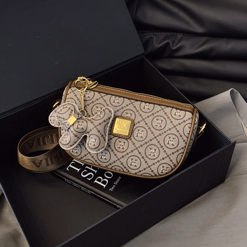 

Элегантная винтажная кожаная сумка для подгузников для женщин, минималистичная дизайнерская роскошная сумка с большой вместимостью, стильная повседневная сумка через плечо.