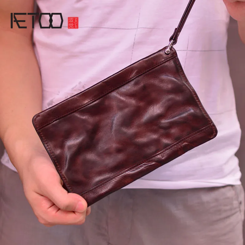 

AETOO Handmade retro thin handbags, top layer leather trendy handbags, men's clutches, leather folds