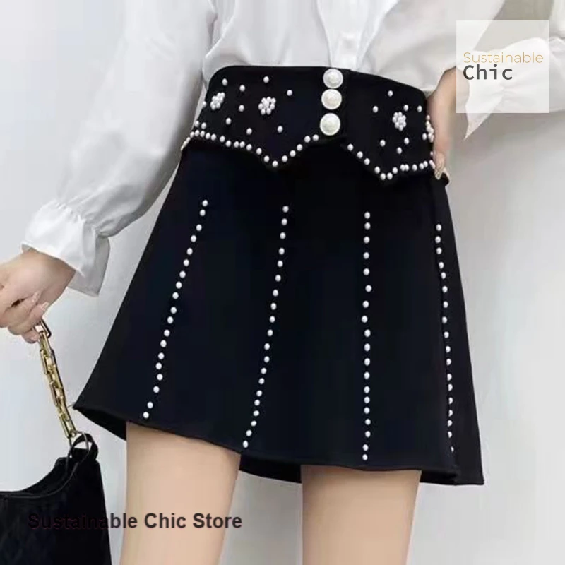 Jupe tricotée de style coréen pour femmes, nouveau style occidental Joker, taille haute, noire, jupe lourde en forme de A avec perles, printemps et automne