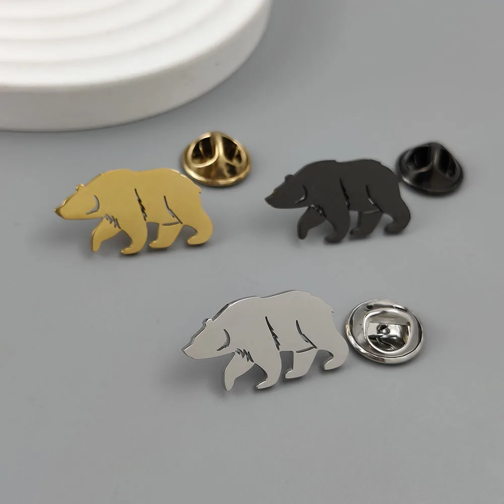 Metal costume brooch. Golden polar bear stainless steel brooch, used as a chest badge pin, as a carrying case decoration