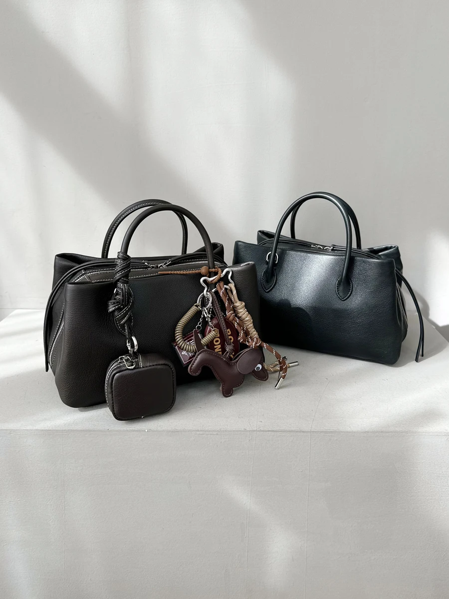 

Top Layer Cowhide Bowling Handbag Tote Bag Boston Pillow Bag Small Luxury Sensation Single oulder Slant Cross Bag for Women