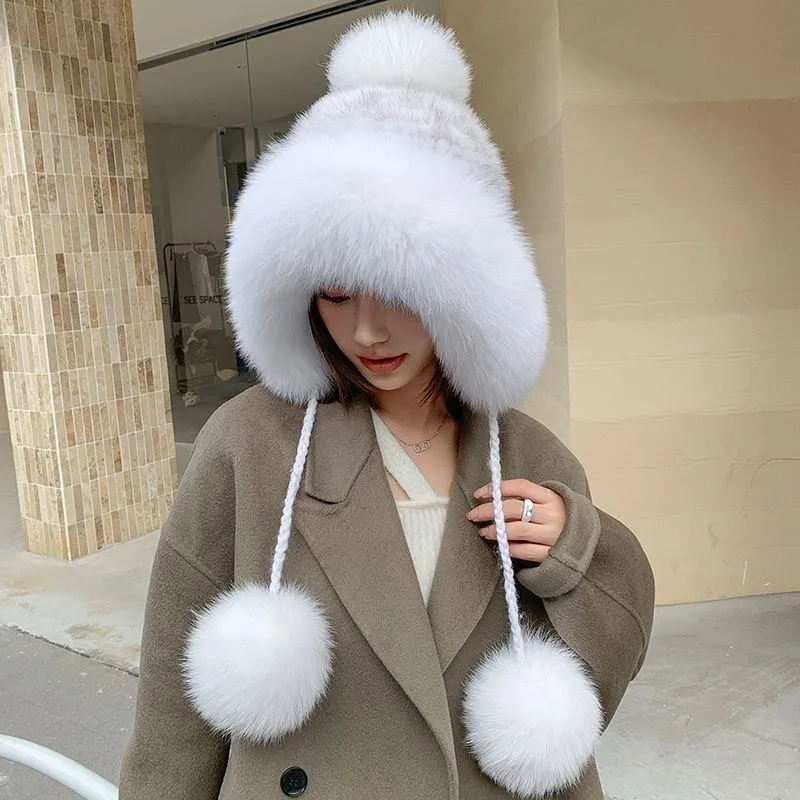 A new winter woolen hat for women featuring cute purple fur ball