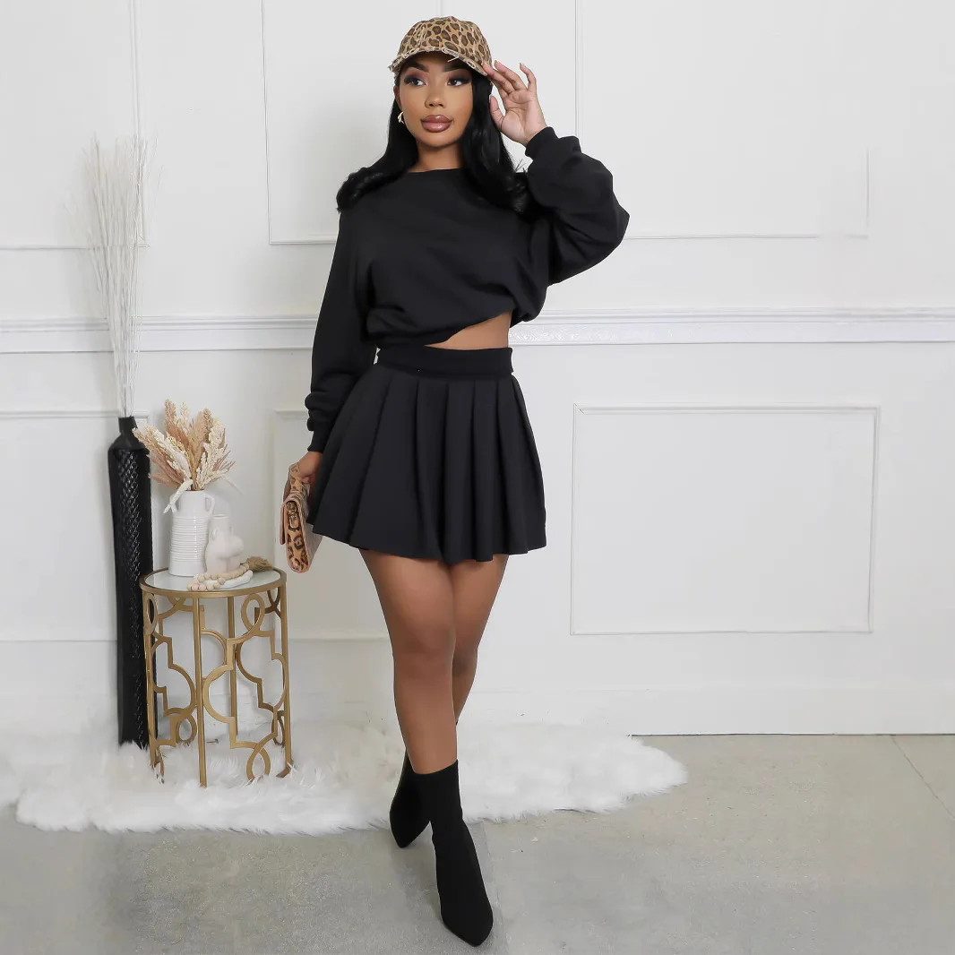 Custom LOGO European and American women\'s clothing new two-piece casual long-sleeved jumper top pleated mini skirt
