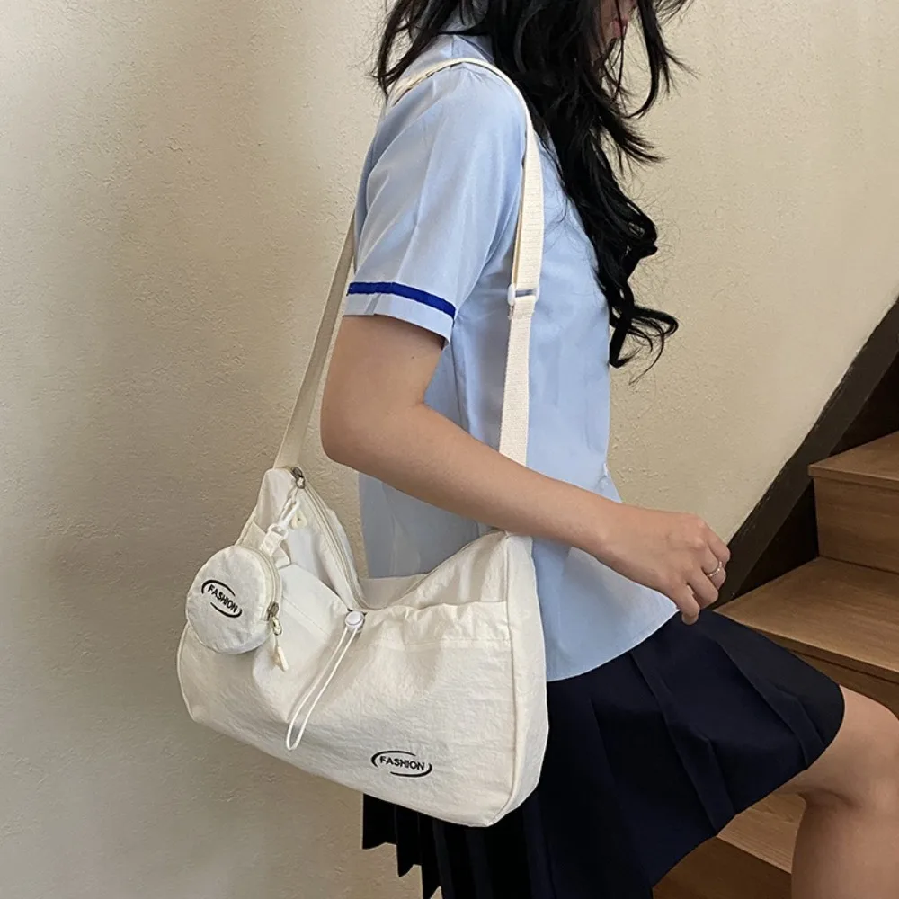 

New Casual Nylon Shoulder Bag Large Capacity Leightweight Drawstring Crossbody Bag Zipper Solid Color Commuting Bag Travel