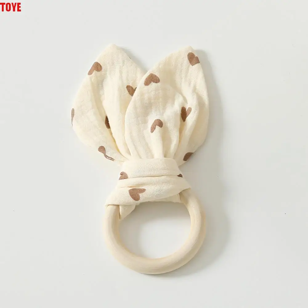 

Soft Baby Wooden Hand Grasp Toy Natural Wooden Rabbit Ears Newborn Teething Ring Sensory Toy Bracelet Rattle Chewing Appease Toy