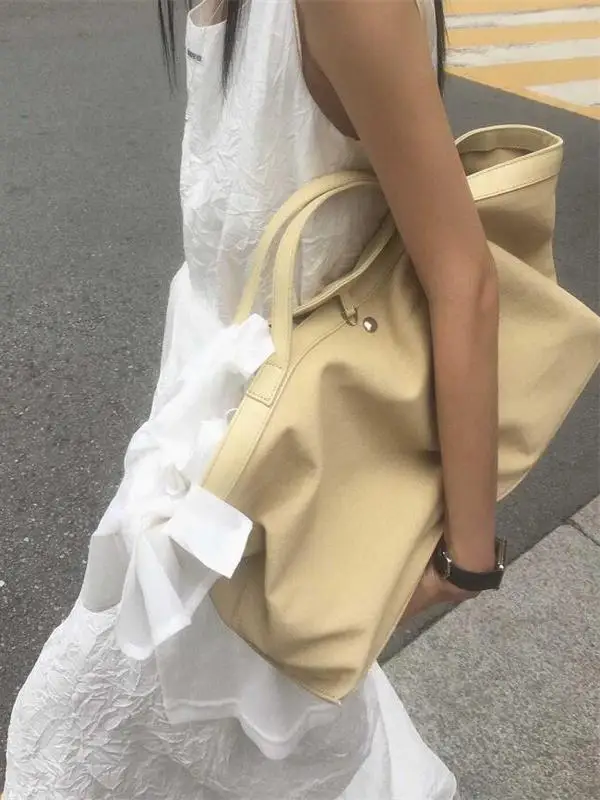 حقيبة كمبيوتر قماشية كبيرة السعة، تصميم جديد لعام 2025، حقيبة حمل للطلاب، حقيبة كتف عادية، حقيبة يد ناعمة قابلة للطي بلون واحد