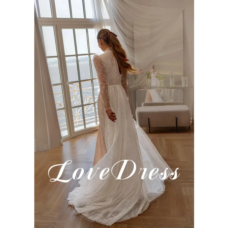 Love Modern Abito da sposa a sirena in pizzo con collo alto Abito da sposa avorio a maniche lunghe Abito da sposa sexy con spacco laterale alto Bottoni senza schienale Lunghezza pavimento