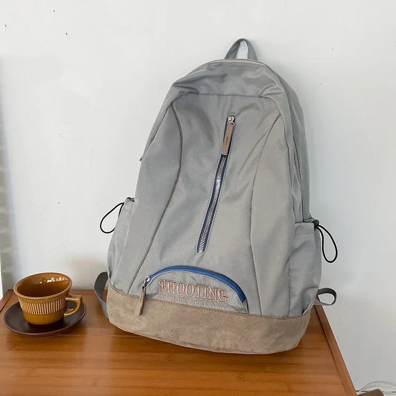 

High Quality Nylon Zipper Classics Backpack 2025 New Lightweight Large Capacity Fashionable Commuting Student Backpack