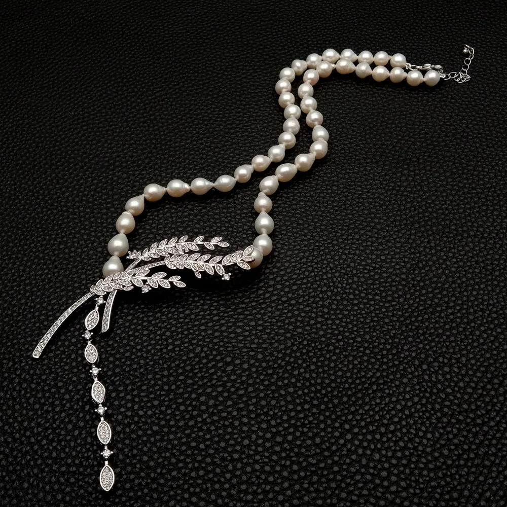 

Freshwater Cultured White Keshi Pearl Necklace Cubic Zirconia Pave Pendant 19"
