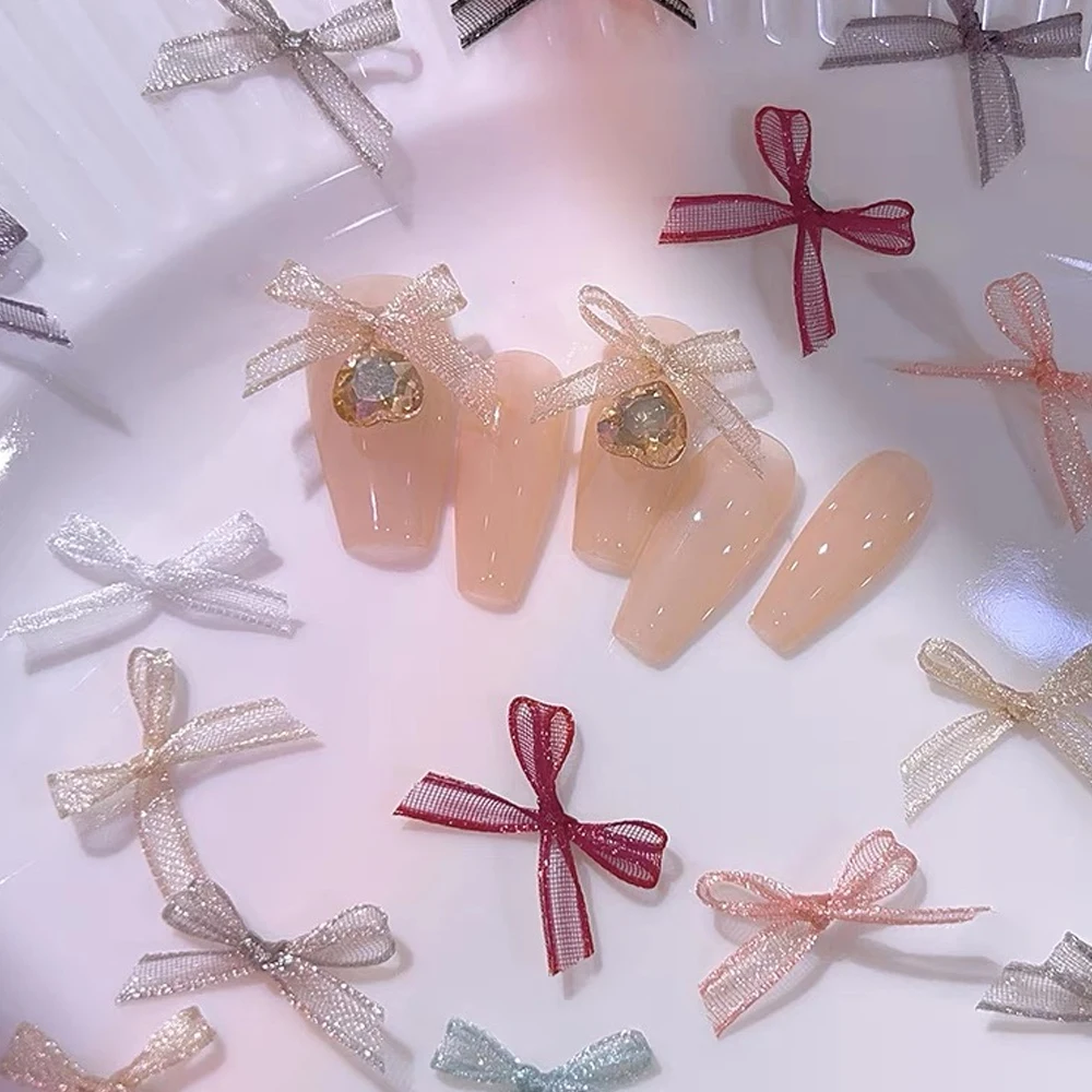 20pcs 3D Organza ริบบิ้น Bowknot เล็บ Charms มินิซาตินลูกไม้ Bowtie ตกแต่งเล็บ DIY หัตถกรรม Hairwear อุปกรณ์แต่งเล็บ