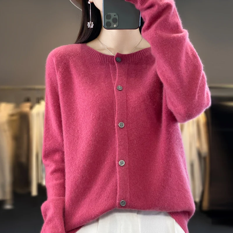 Autumn and winter new Merino 100% wool solid color warm female O-neck knitted long sleeve solid color cardigan