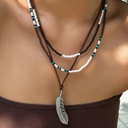 Salircon Bohemian Mixed Color Rice Bead Beaded Necklace Vintage Metal Feather Pendant Rope Chain Necklace Women's Ethnic Jewelry