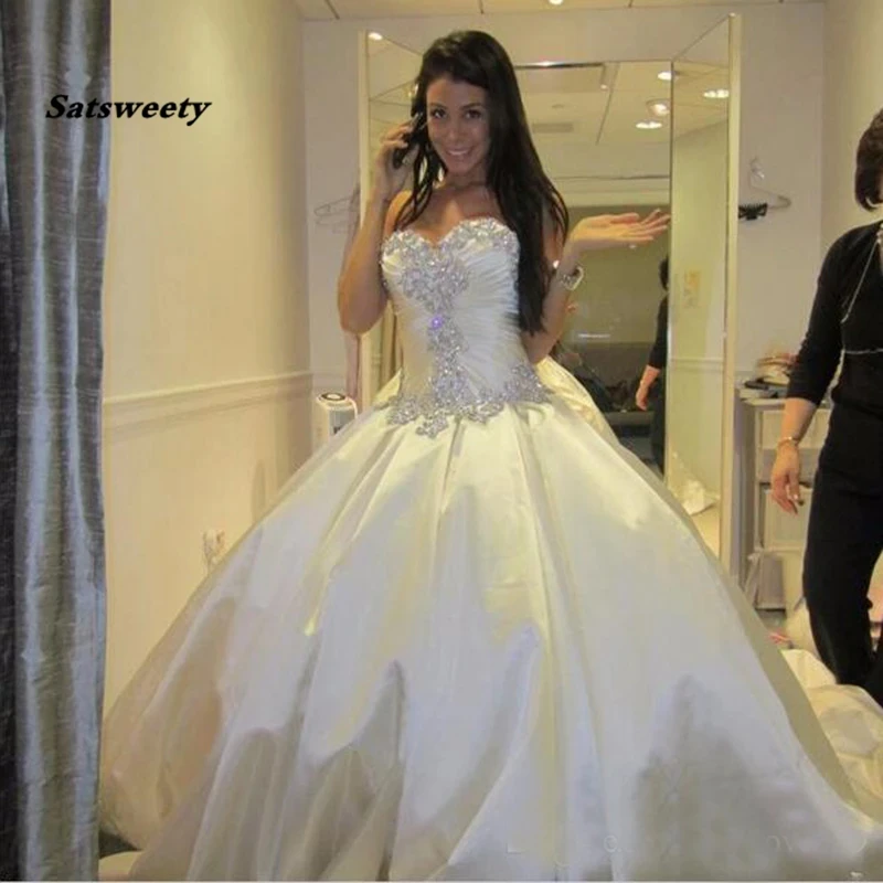 Ivory Bling Pnina Tornaiชุดแต่งงานSweetheart Ball Gowns SparklyคริสตัลBacklessยาวชุดเจ้าสาวราคาถูก