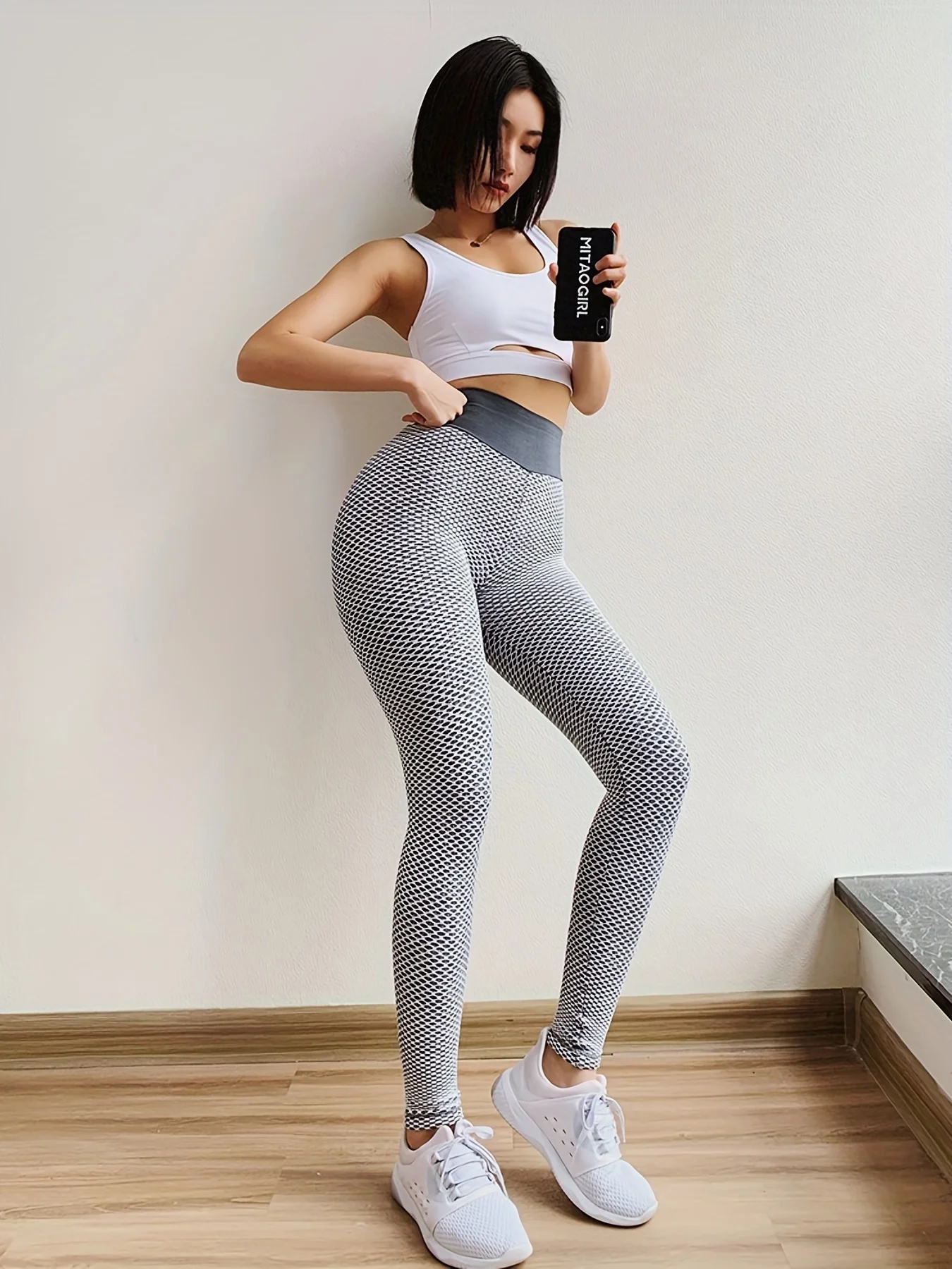 Sports leggings jacquard honeycomb bubble yoga pants women\'s European and American high waisted and hip lifting tight pants