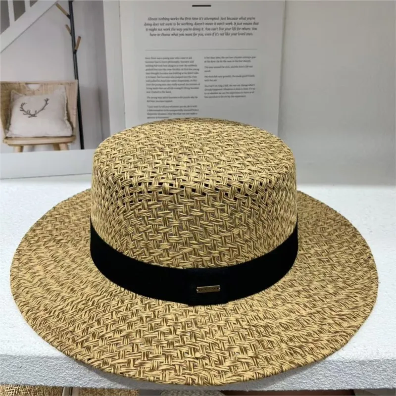 

A sunshade salted grass hollowed-out flat-brimmed hat for women top seaside photography vacation and travel