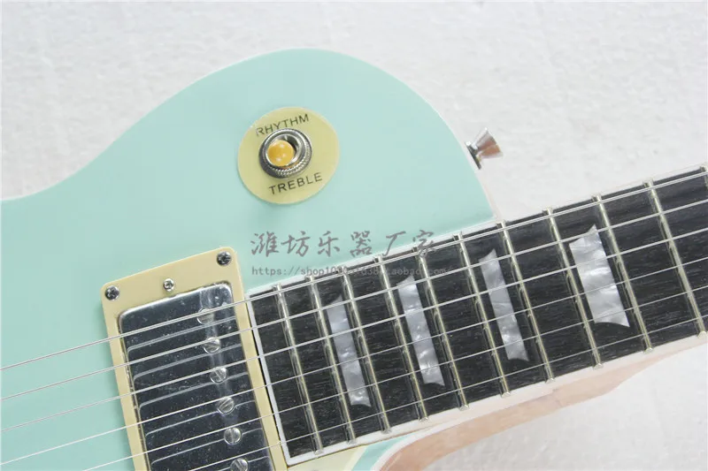 Electric guitar front light sky blue back natural wood color body pentagonal star guard