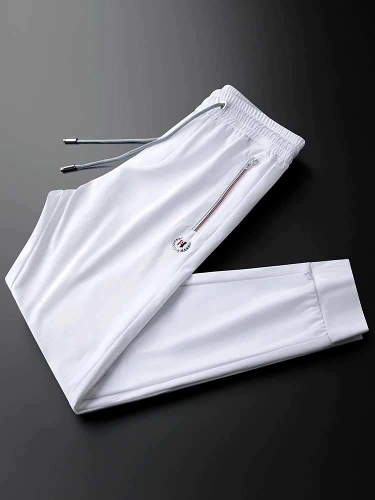 

Ice Silk Slim Fit Casual Sports Pants Men's Lightweight Qui Dry Color Smooth Summer Leisure Trousers by Ja Charles