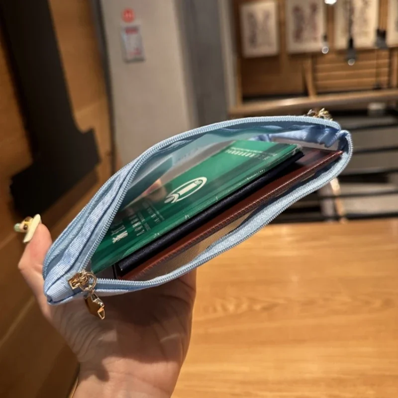 かわいいサンリオのかわいいハローキティアニメ周辺グッズPVCコインパースマイメロディパスポートジッパーハンドIDバッグ口紅収納バッグ