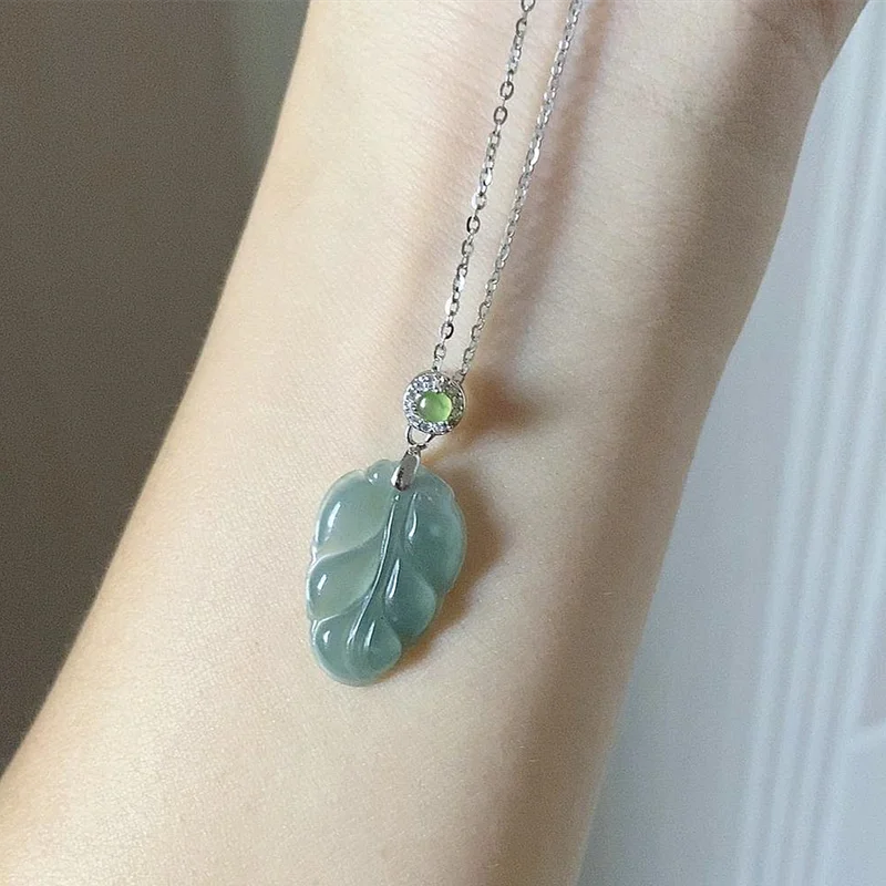 

Natural Guatemalan Highly Translucent Sky Blue/Light Blue Jadeite Carved Leaf Pendant/ 925 sliver jade necklace charm