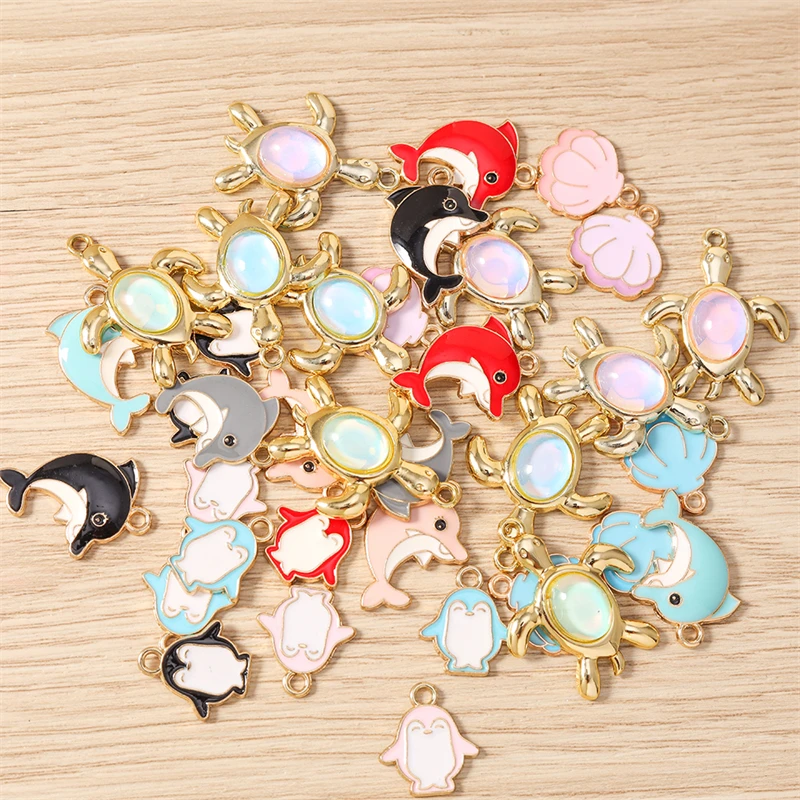 10 Stück niedliche Emaille-Anhänger mit Motiven von Meerestieren wie Pinguinen, Delfinen und Muscheln, zum Basteln von Schmuck, Ohrringen, Halsketten und für DIY-Bastelarbeiten. – Detail 2