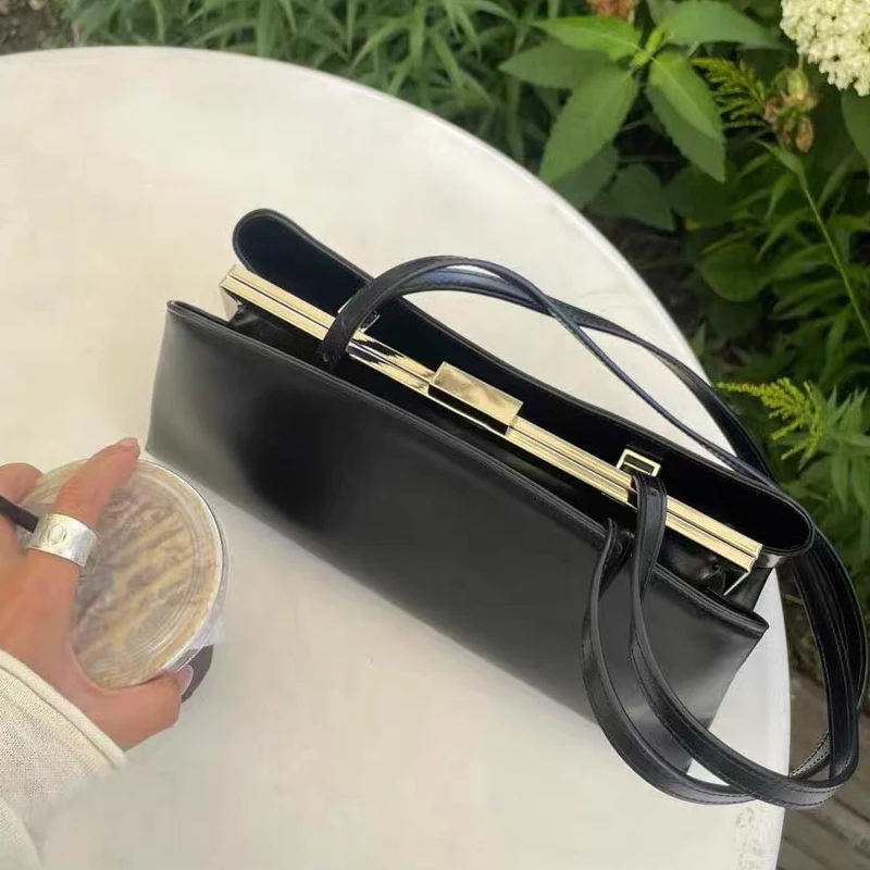 Hoogwaardige metalen frame clip tas dames luxe pu handtassen meerlaagse magnetische gesp portemonnee Franse nieuwe elegante onderarmtas