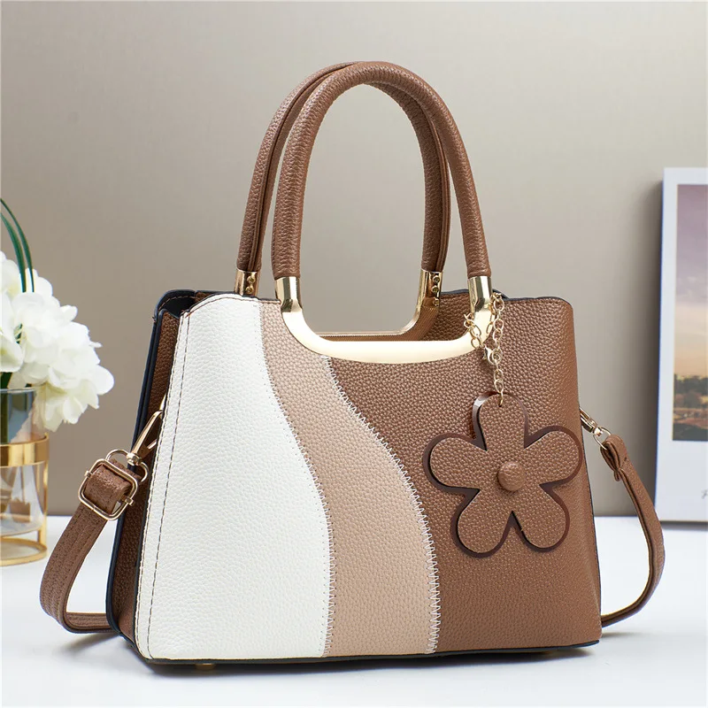 2024 new splicing contrasting colors large-capacity fashionable portable shoulder bag exquisite accessories casual foreign commu