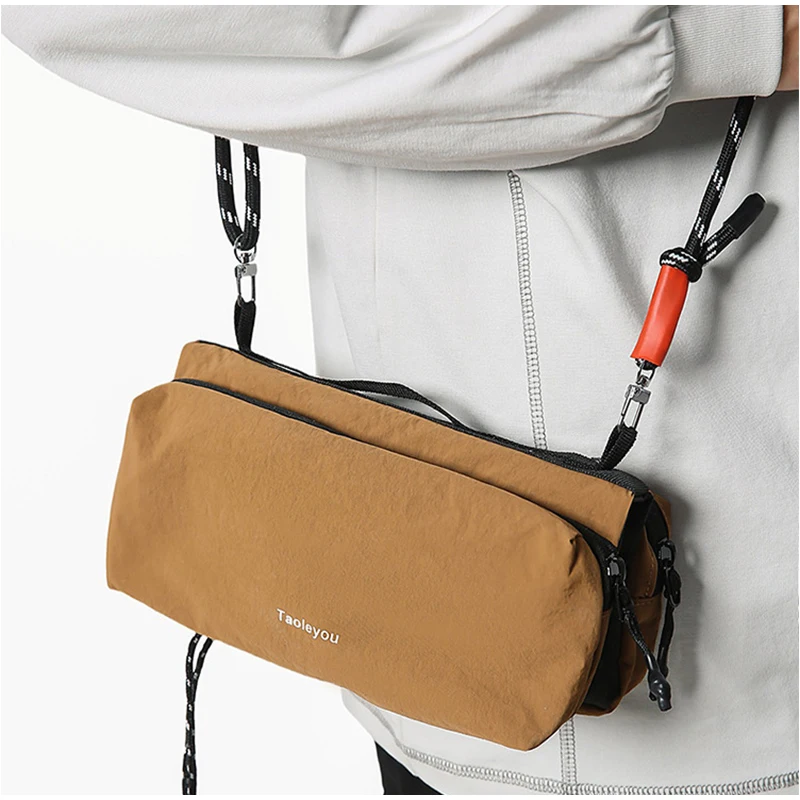 브랜드 휴대용 야외 메신저 가방 Ins 패션 간단한 가슴 가방 허리 가방 새로운 커플 땋은 밧줄 다기능 어깨 가방