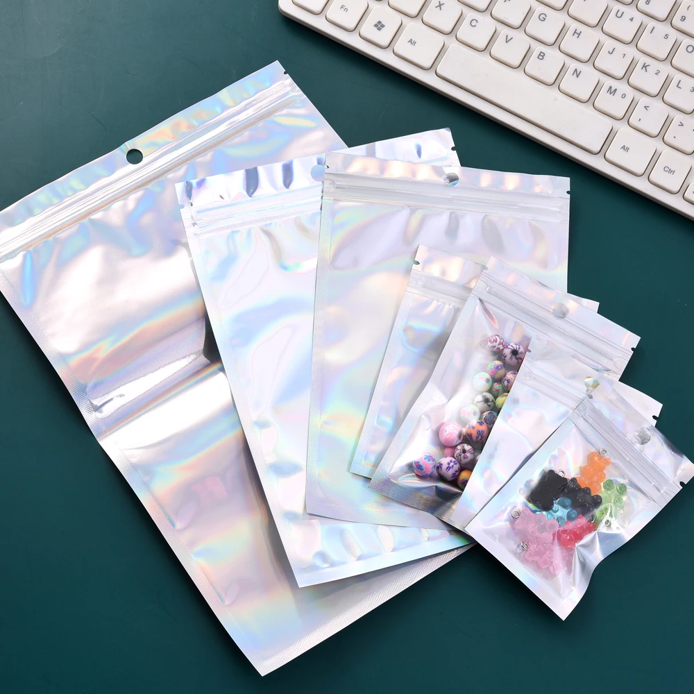 100 Stück Laser-Regenbogen-Polyethylen-Selbstverschlussbeutel, transparente Laser-Verpackungsbeutel für Schmuckzubehör und Einzelhandelsdisplays – Detail 5