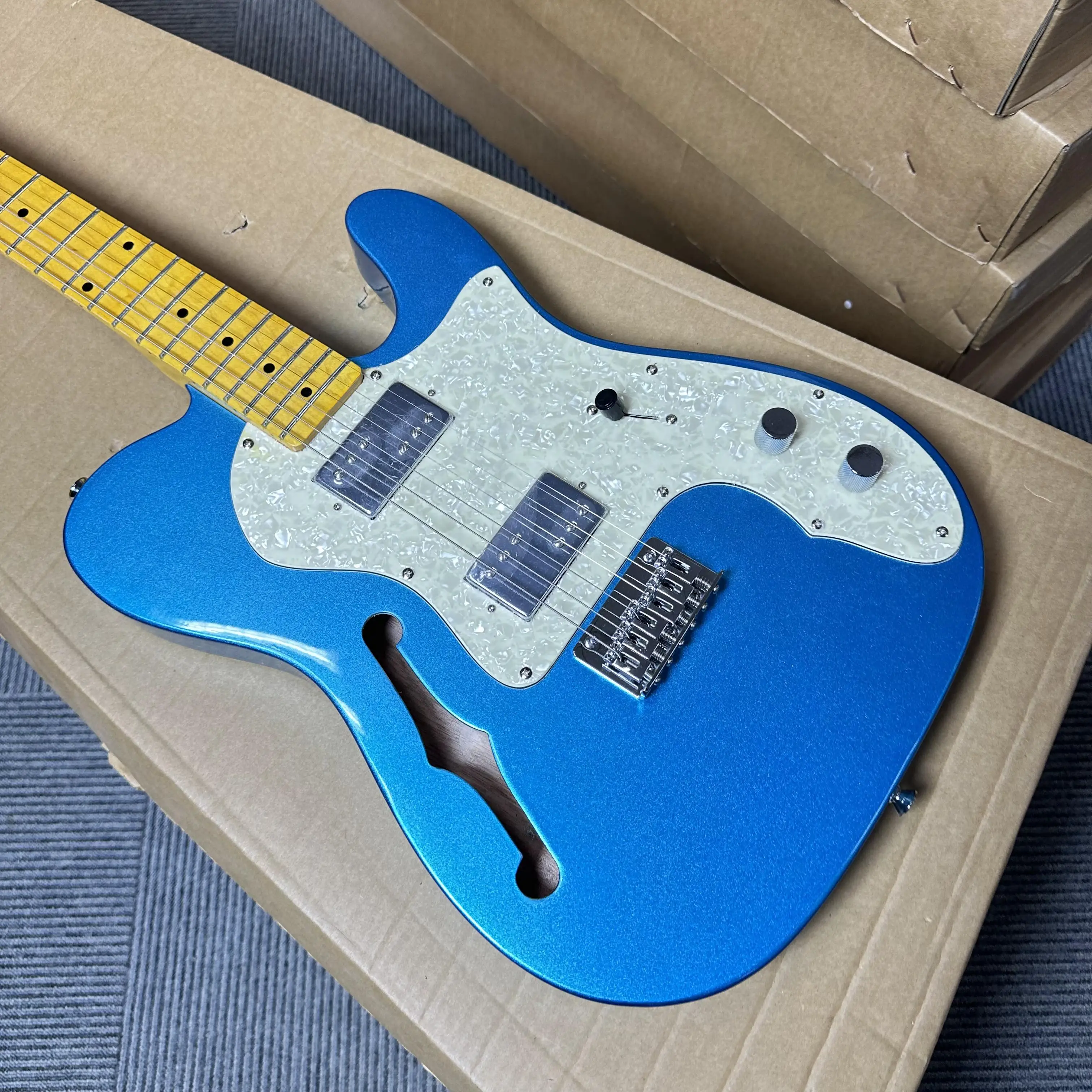 

Custom Blue TELE Electric Guitar HH Pickup Tremolo Bridge Cream Pearl Pickguard