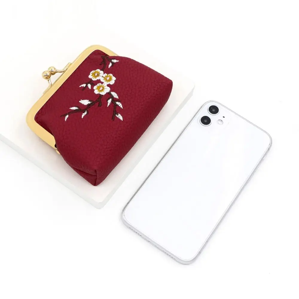 กระเป๋าใส่เหรียญปักลายดอกพลัมขายส่ง พกพาสะดวกอเนกประสงค์ ใช้เป็นที่ใส่บัตรเครดิตได้ เป็นกระเป๋าคลัทช์ขนาดเล็ก เหมาะสำหรับเป็นของขวัญ