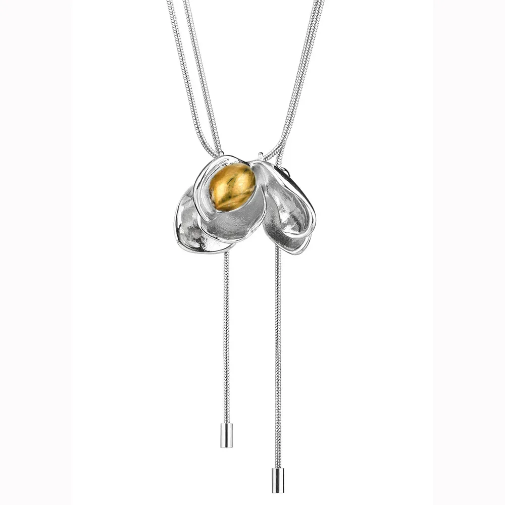 

This one features a two-color floral sweater chain and a unique rose necklace