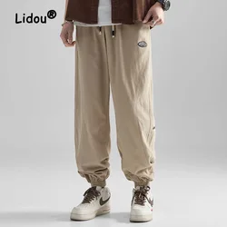Pantalones Cargo de algodÃģn para hombre, pantalÃģn holgado de Color sÃģlido con bolsillos y cordÃģn en la cintura, informal, a la moda