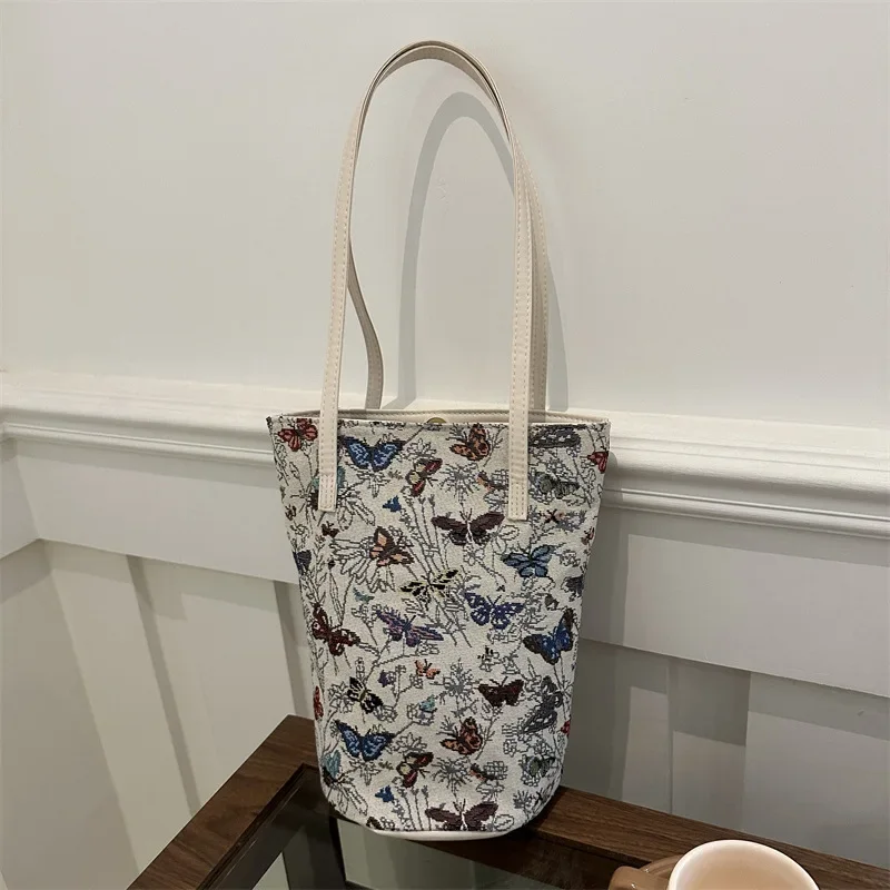 Mori-Bolso de mano de lino estilo pintura al óleo Retro ligero, nueva moda, bolso tipo cubo con mariposa, bolso de hombro de gran capacidad para mujer 2024