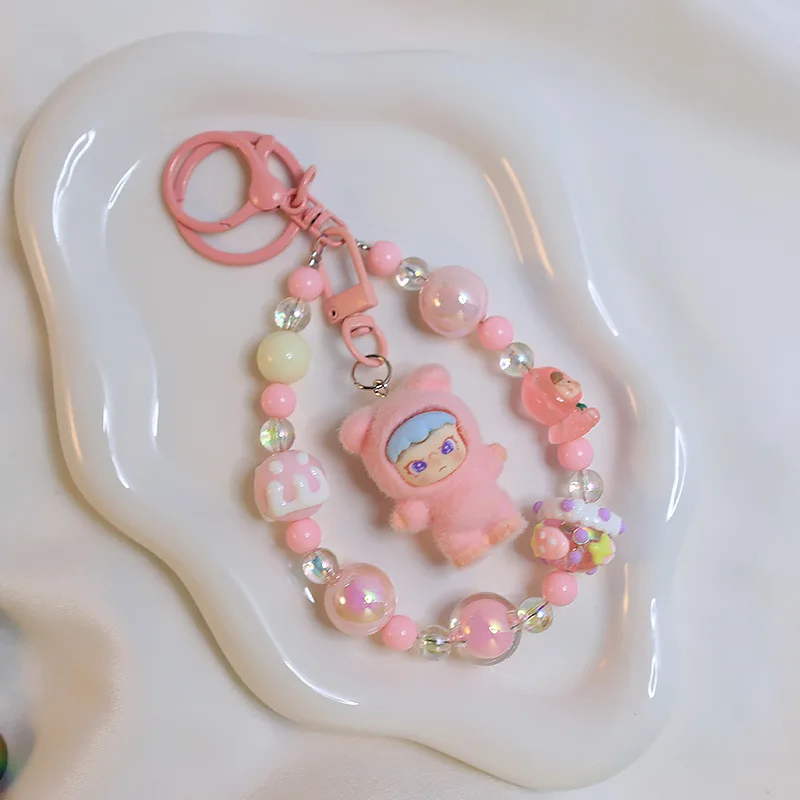 

Labubu creative keychain hand-painted beaded charm teenage heart cute cute labubu backpack accessories pendant gift