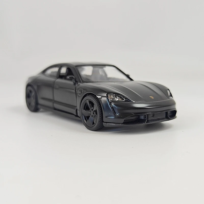 

1:36 simulation Porsche TAYCAN alloy car model with doors that can be opened rich in details, finely crafted, and good quality