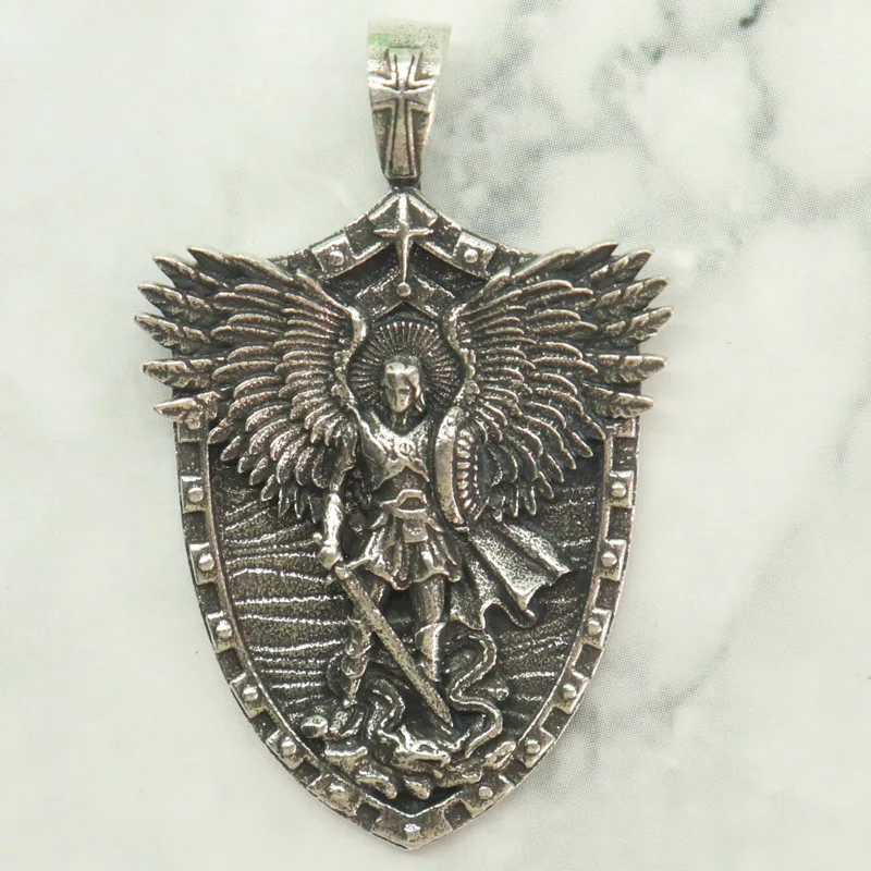 

Buy 3 Get 1 Free 13g Holy light cleaves the chaos. Michael hovers above the abyss, wings unfurled Silver Plated Pendant Mens