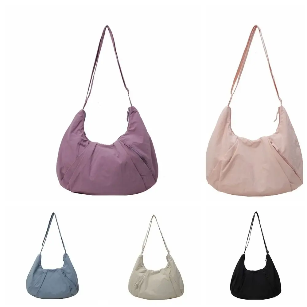 กระเป๋าสะพายไหล่ไนลอนสไตล์เกาหลี กระเป๋าโท้ทความจุขนาดใหญ่ กระเป๋าทรงเกี๊ยวลำลอง สีพื้น ผ้าอ็อกซ์ฟอร์ดพับได้ กระเป๋าใต้วงแขน กระเป๋าเดินทาง