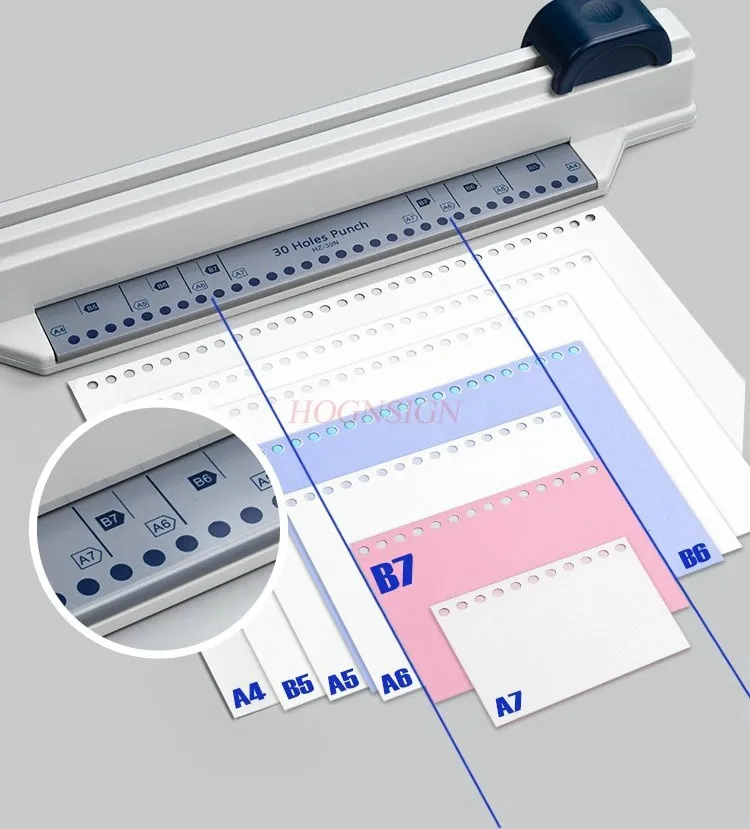 Hand pushed loose leaf notebook puncher with 30 circular holes, notebook puncher