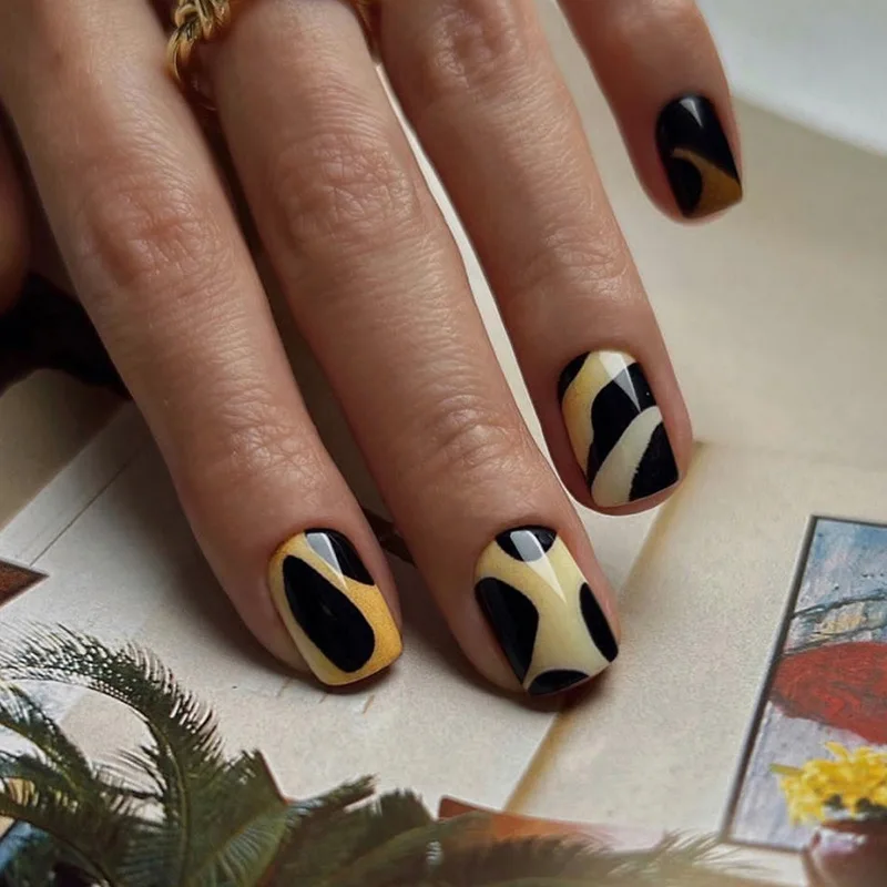 

24pcs Bold Press-On Nails - Yellow Ombré With Black Accents Short Oval Edgy Minimalist Style False Nails With Wearing Tools