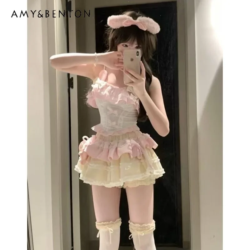 

2025 Summer Pink Lace Splicing Cute Women's Camisole Japanese Design Design Sweet Versatile Yellow Puffy Short Skirts Set Ladies